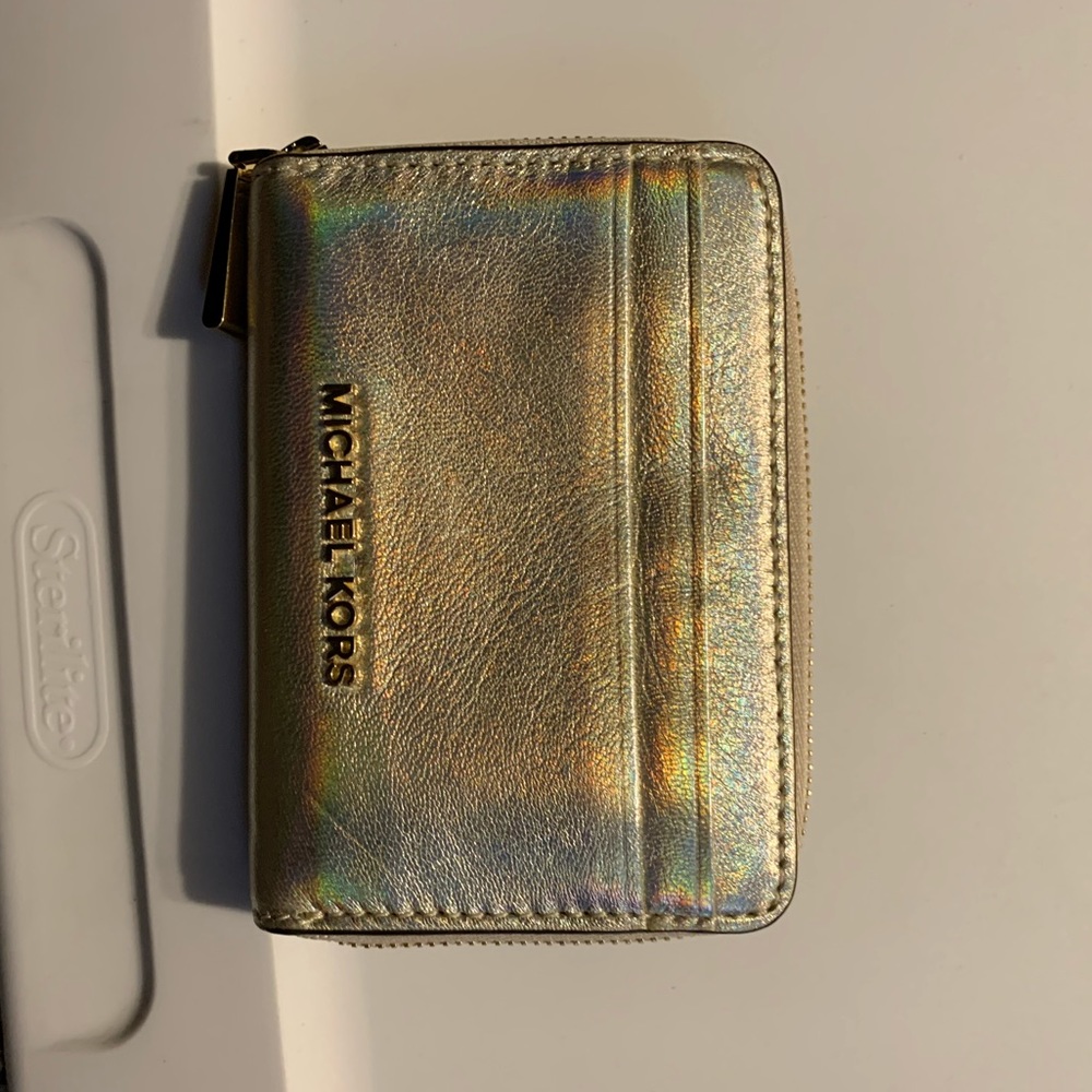 Michael kors wallet. metallic color
